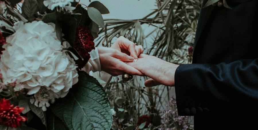 The Bride Holds the Ring in Her Hands